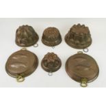 JELLY MOULDS, six,copper, a pair decorated with fish, largest 24cm W. (6)