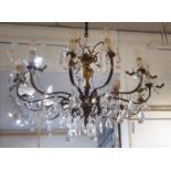 CHANDELIER, twelve branch metal with faceted glass drops, 59cm H.