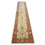 FINE SULTANABAD RUNNER, 345cm x 77cm, all over palmette and vine ivory field within a matching