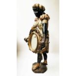 VENETIAN DRESSING MIRROR, early 19th century carved gilded and polychrome painted figure holding a