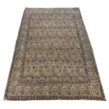 ANTIQUE PAISLEY DESIGN QUM RUG, 206cm x 133cm.