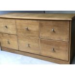 CHEST, 1950's oak with six deep drawers and silvered knobs, 182cm x 61cm x 92cm H.