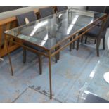 DINING TABLE, with a glass top and gilt metal base, 75cm H x 184cm x 80cm.