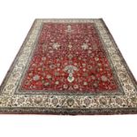 FINE SAFAVID DESIGN TABRIZ CARPET, 415cm x 293cm, all over palmette and vine design.