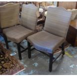 DINING CHAIRS, a set of twelve, Georgian style mahogany with studded detail, serpentine front rails,