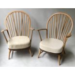 ERCOL ARMCHAIRS, a pair, arched bentwood with stick backs, elm seats and splay supports, 74cm W. (2)