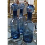 DECANTERS, a set of three, contemporary blue tinted glass, 56.5cm H approx. (3)
