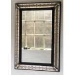 WALL MIRROR, 19th century rectangular with repoussé silvered metal and ebonised frame, 97cm x 67cm.