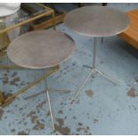 SIDE TABLES, a graduated pair, contemporary polished metal design, 53cm H x 39.5cm Diam at