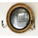 REGENCY CONVEX GIRANDOLE MIRROR, circular giltwood sphere decorated, ebony slip, original mirror