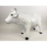 BUTCHERS SHOP DISPLAY MODEL COW, of large proportions, terracotta with a white crackle glaze, 40cm H