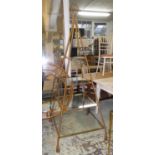 DISPLAY STANDS, a pair, of pyramid form gilt rope twist supports with glass shelves, 200cm H x