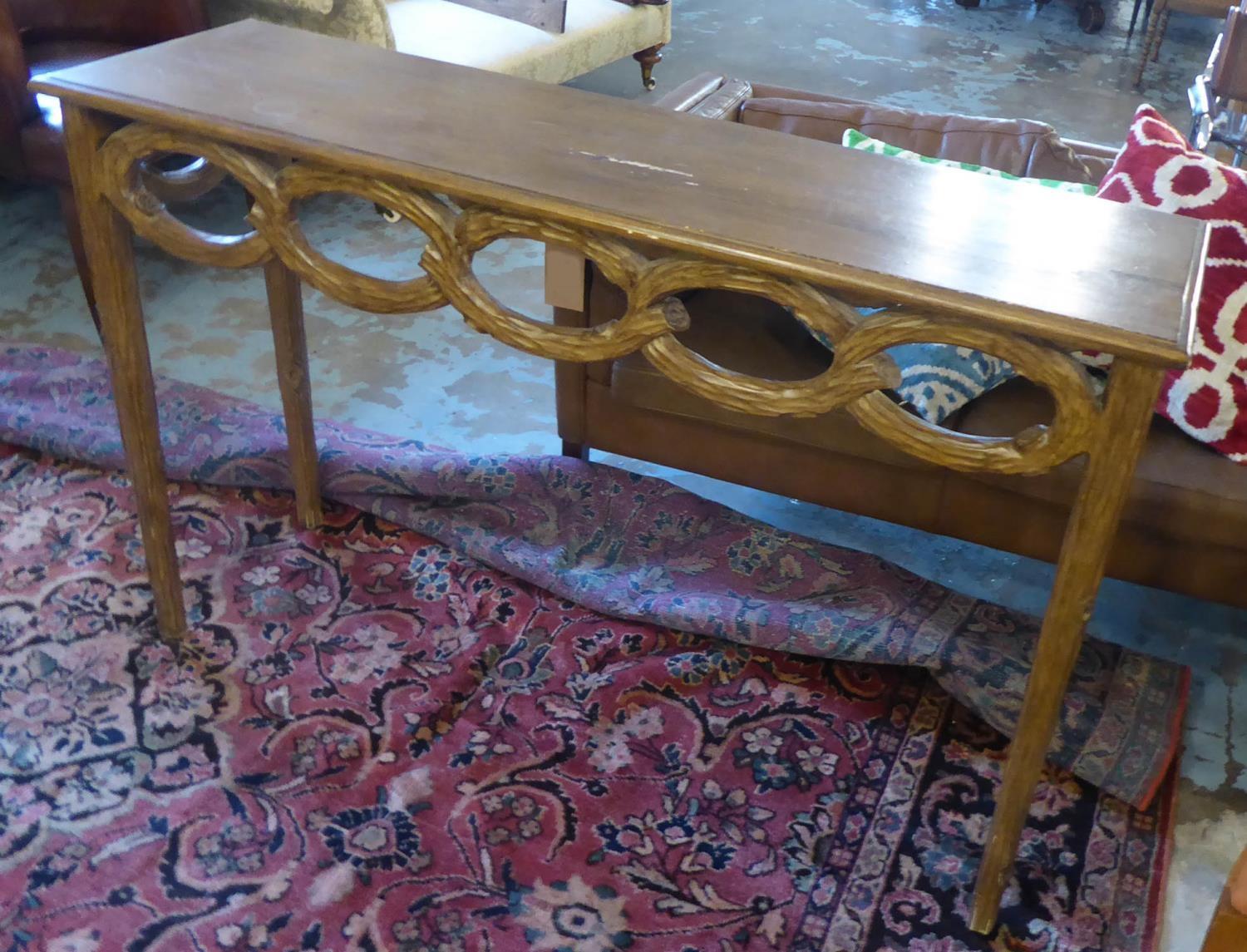 CONSOLE TABLE, of naturalistic design with hoop decoration, 137cm L x 87cm H x 40cm D. (with faults)