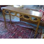 CONSOLE TABLE, of naturalistic design with hoop decoration, 137cm L x 87cm H x 40cm D. (with faults)