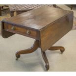 PEMBROKE TABLE, Regency mahogany, with hinged top above a drawer to each end, on brass castors, 73cm