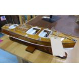 RIVA AQUARAMA MODEL BOAT, on stand, 60cm x 18cm x 23cm approx.