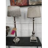 TABLE LAMPS, a near pair, hide shades, 61.5cm at tallest approx. (2)