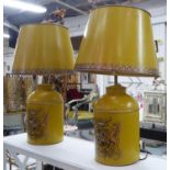 TABLE LAMPS, a pair, mustard toile with metal shades and heraldic detail to base, 73cm H. (2)