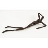 AFTER ALBERTO GIACOMETTI, bronze sculpture of reclining nude, 12cm H x 41cm.