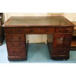 PEDESTAL DESK, Victorian mahogany, with tooled green leather top over an arrangement of nine