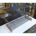 SHOE RACK, 1960's French style, gilt metal with black painted detail, 83cm x 34cm x 54cm.