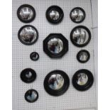 WALL MIRRORS, a set of twelve, Regency style, various sizes and descriptions, ebonised finish,