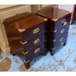 BEDSIDE CHESTS, a pair, military style mahogany and brass mounted, each with three drawers, 58cm H x