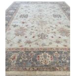 FINE OUSHAK CARPET, 360cm x 275cm, palmette and vine ivory field.