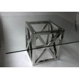 OKA TABLE, square glass raised upon X chrome support, 152cm x 152cm x 76cm H.