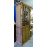 BOOKCASE, Georgian style pine with astragal glazed door and panel door below, 83cm x 44cm x 195cm.