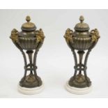 CASSOLETTES, a pair, late 19th/early 20th century French gilt and patinated spelter on white
