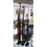 FAMILY OF GIRAFFES, polychrome finish, 200cm at tallest. (3)