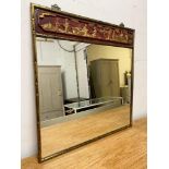 WALL MIRROR, Chinese faux bamboo gilt and scarlet painted frame, with a carved figural frieze,