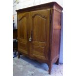 ARMOIRE, late 18th/early 19th century French cherrywood and chestnut with two panelled doors