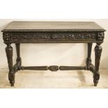 SIDE TABLE, late Victorian ebonised oak with a single carved frieze drawer on fluted turned supports