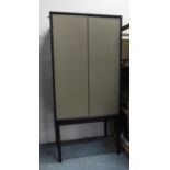 DRINKS CABINET, contemporary design, ebonised supports, 80cm x 50cm x 171cm. (slight faults)