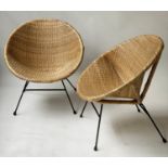 BASKET ARMCHAIRS, a pair, 1950's Italian woven wicker on painted black iron with rubber toes, 74cm