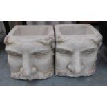 MOUSTACHED GENTLEMAN PLANTERS, a pair, 36cm x 46cm x 36cm. (2)