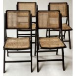 CANE DINING CHAIRS, a set of four, vintage 1970's, folding with paneled backs and seats, 83cm tall