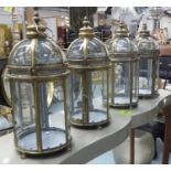 LANTERNS, a set of four, gilt metal, 53cm H. (4)