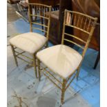 SIDE CHAIRS, a pair, 19th century giltwood with faux bamboo frames, 41cm x 83cm H. (2) (with faults)