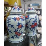 TEMPLE JARS, a pair, with design inspired by a vase in the Ashmolean museum, Oxford, 43cm H. (2)