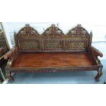 INDIAN LOUNGE SET, contemporary carved, with elephant detail to arms, includes sofa and two