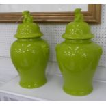 TEMPLE JARS, a pair, contemporary lime green glazed finish with covers, 48cm H. (2)