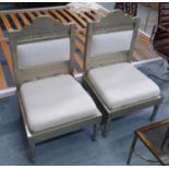 INDIAN MANDAP CHAIRS, a pair, repoussè with white fabric upholstery, 93cm H. (2)
