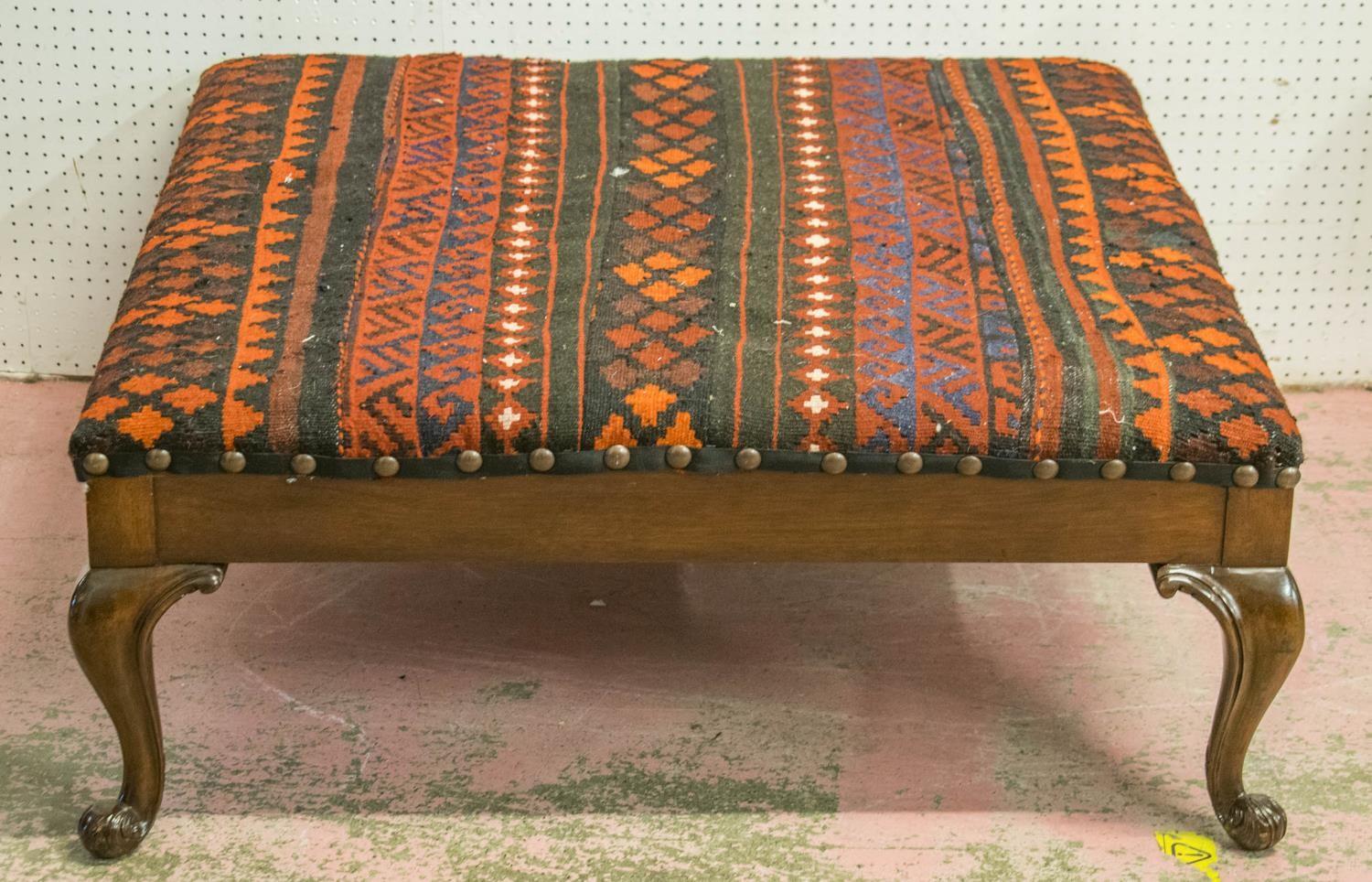 HEARTH STOOL, Georgian style mahogany with square top in red kilim, 39cm H x 95cm.