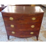 BOWFRONT CHEST, George III mahogany with three long drawers and a shaped apron on swept bracket