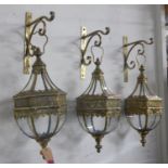 WALL HANGING CANDLE LANTERNS, a set of three, Georgian style design, 70cm H x 23cm W. (3)