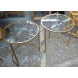 SIDE TABLES, a pair, 1960's French style, gilt metal with circular tops, 52cm H x 50cm. (2)