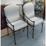 DINING CHAIRS, a matched set of six, painted black metal with loose seat cushions, 105cm at tallest.